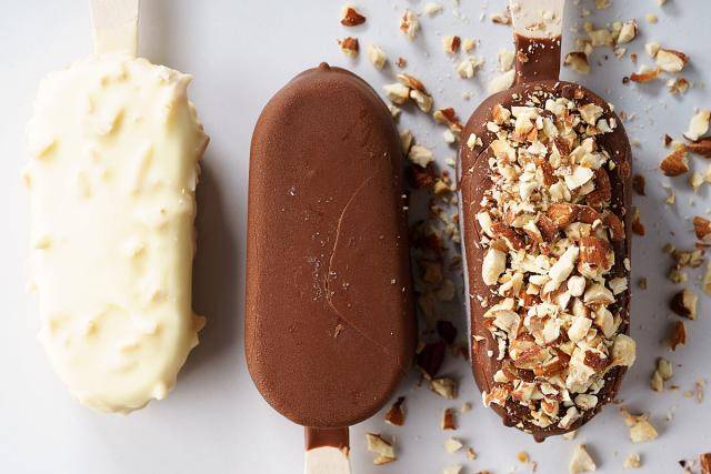 Ice cream sticks with chocolate and nuts