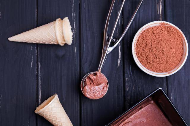 ice cream cone and scoop of chocolate ice cream