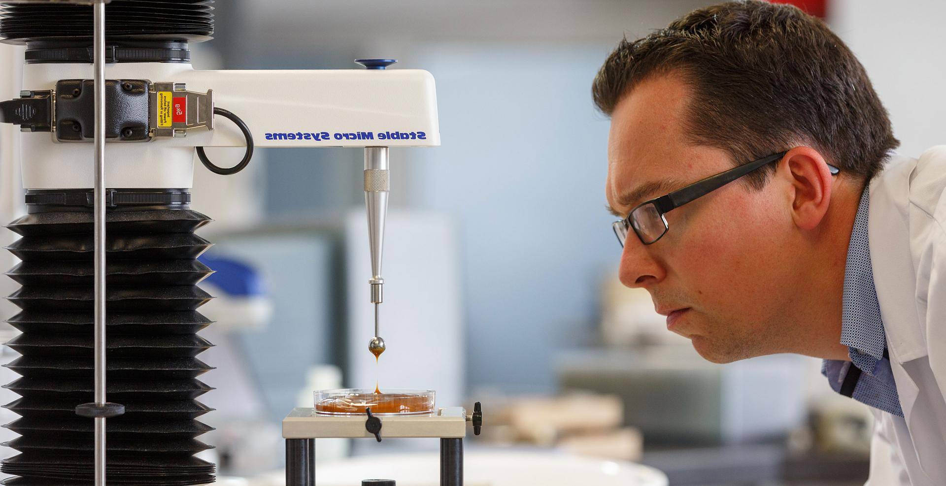 Chocolate expert working with technical equipment