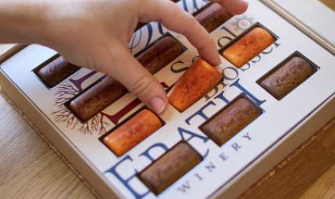 box of chocolates with hand reaching in