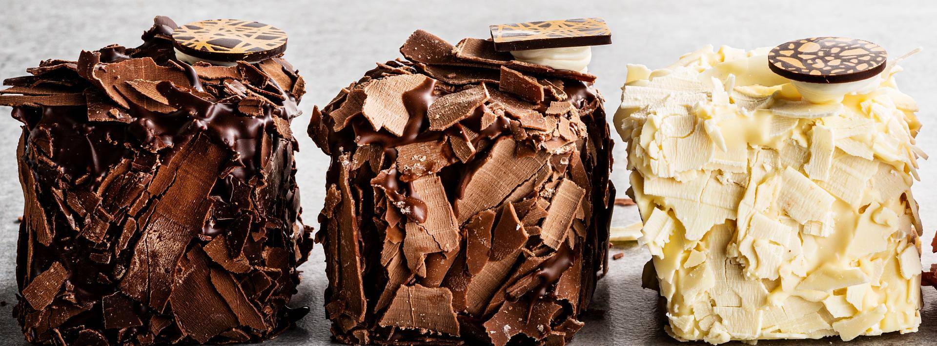 Merveilleux pastries with white, milk and dark chocolate shavings