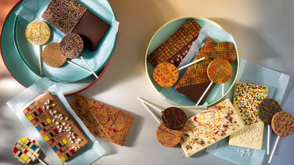 Various tablets and lollipops with prints and sprinkles