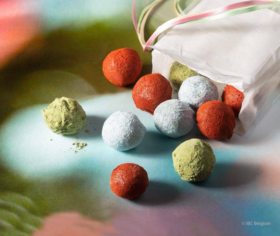Chocolate truffles, green, red, silver and white truffle powder