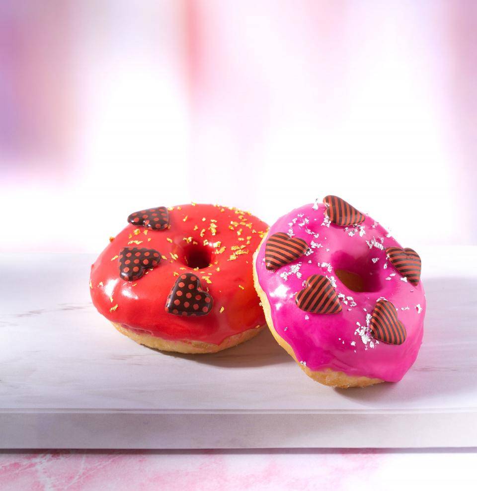 Valentine's Day donuts with pink and red glaze and chocolate hearts