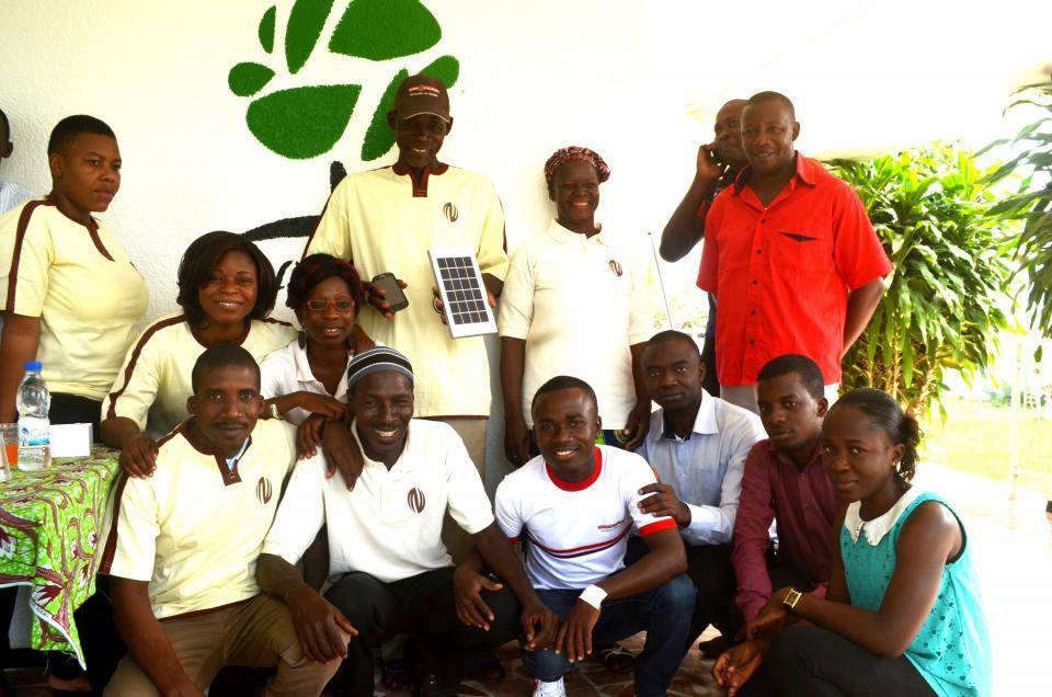 Zallé Alimissi Salame getting his new mobile phone and solar charger.