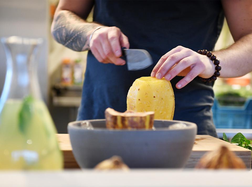 a chef at work with cacaofruit