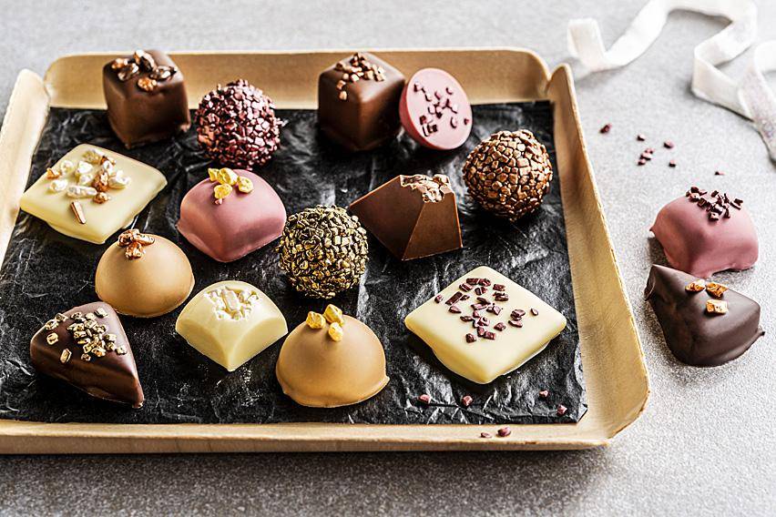 A selection of pralines with metallic flakes
