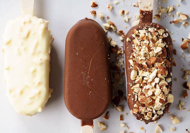 Ice cream sticks with chocolate and nuts